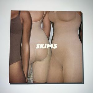 Skims Sculpting Bodysuit Briefs with Snaps in Clay